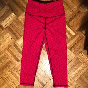 red and black knockout leggings. Victoria sport